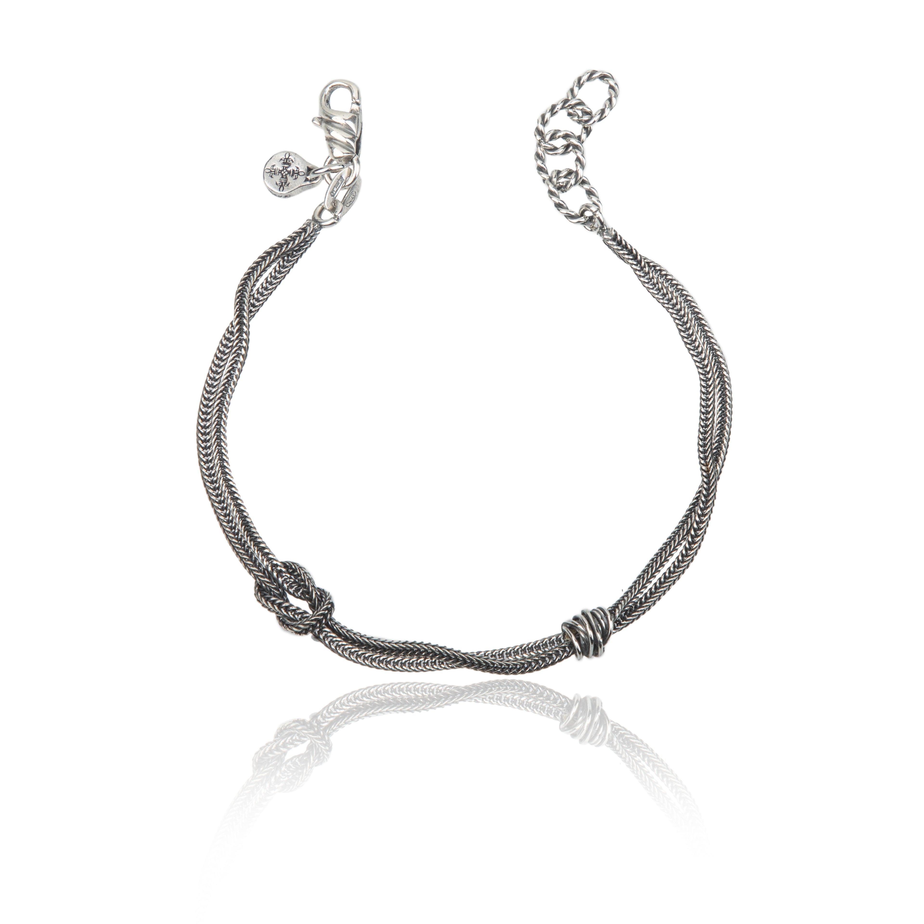 Bracciale in argento 925 brunito, intrecci e nodi simbolici.