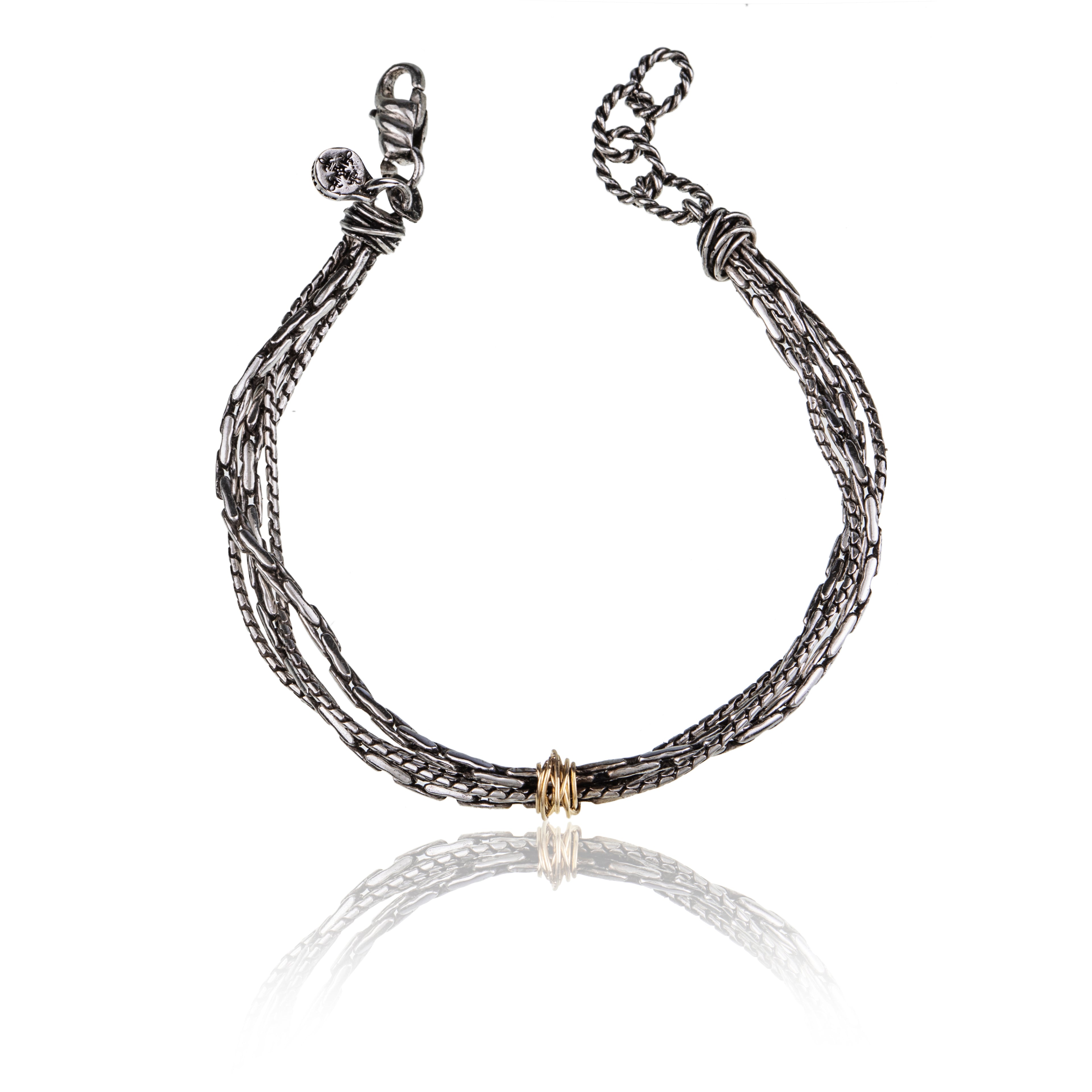 Bracciale uomo in argento 925 e oro 18kt, elegante e robusto.