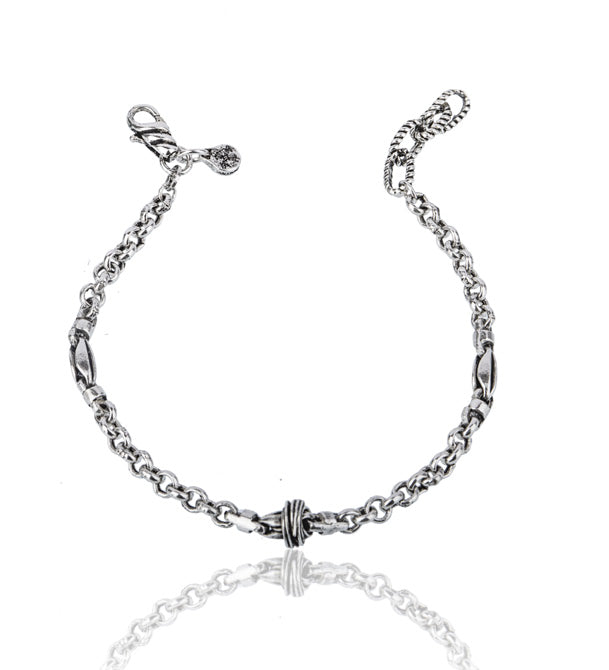 Bracciale uomo in argento 925 a maglia rolò con nodo centrale lavorato a mano.